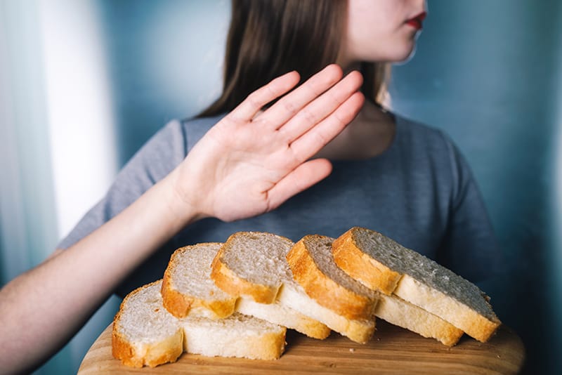 Woman saying no to bread