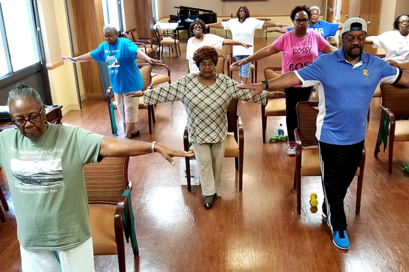 Older adults performing balance exercises - Photo from the National Council on Aging