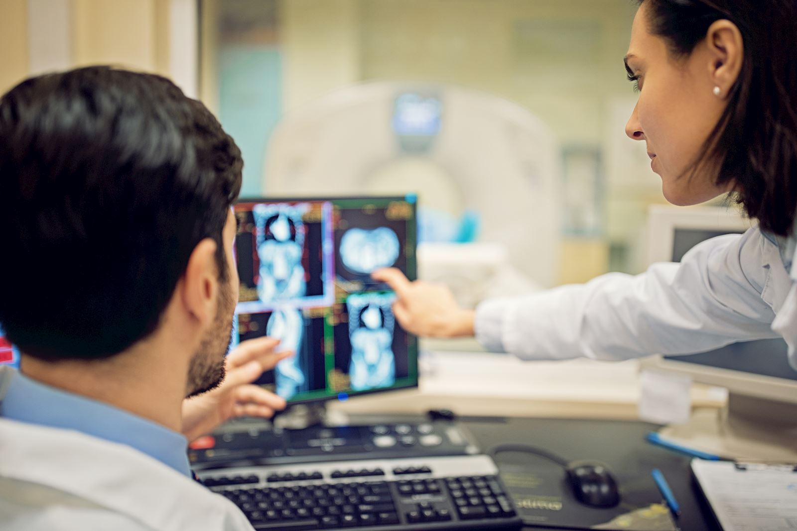 two doctors reviewing scans