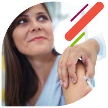 women receiving shot from doctor