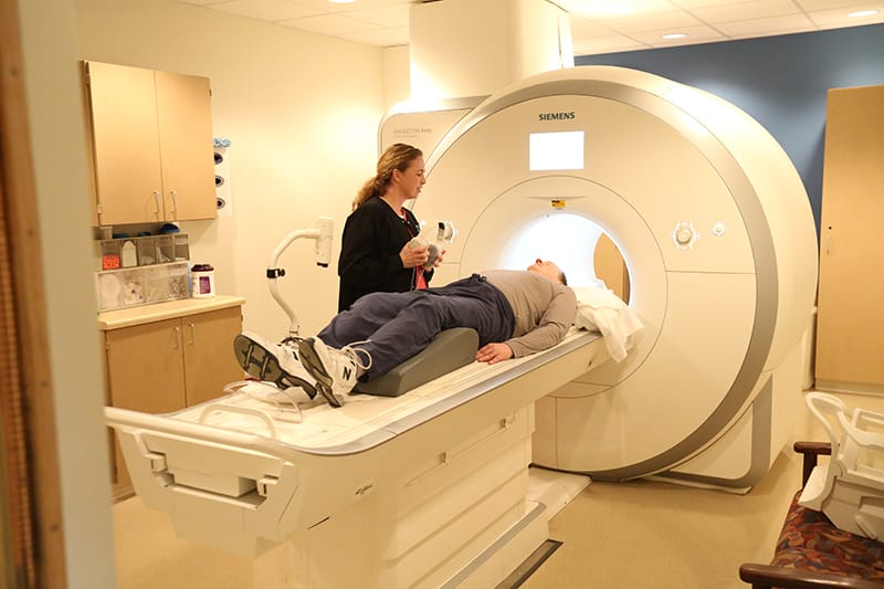 Nurse with patient getting an MRI