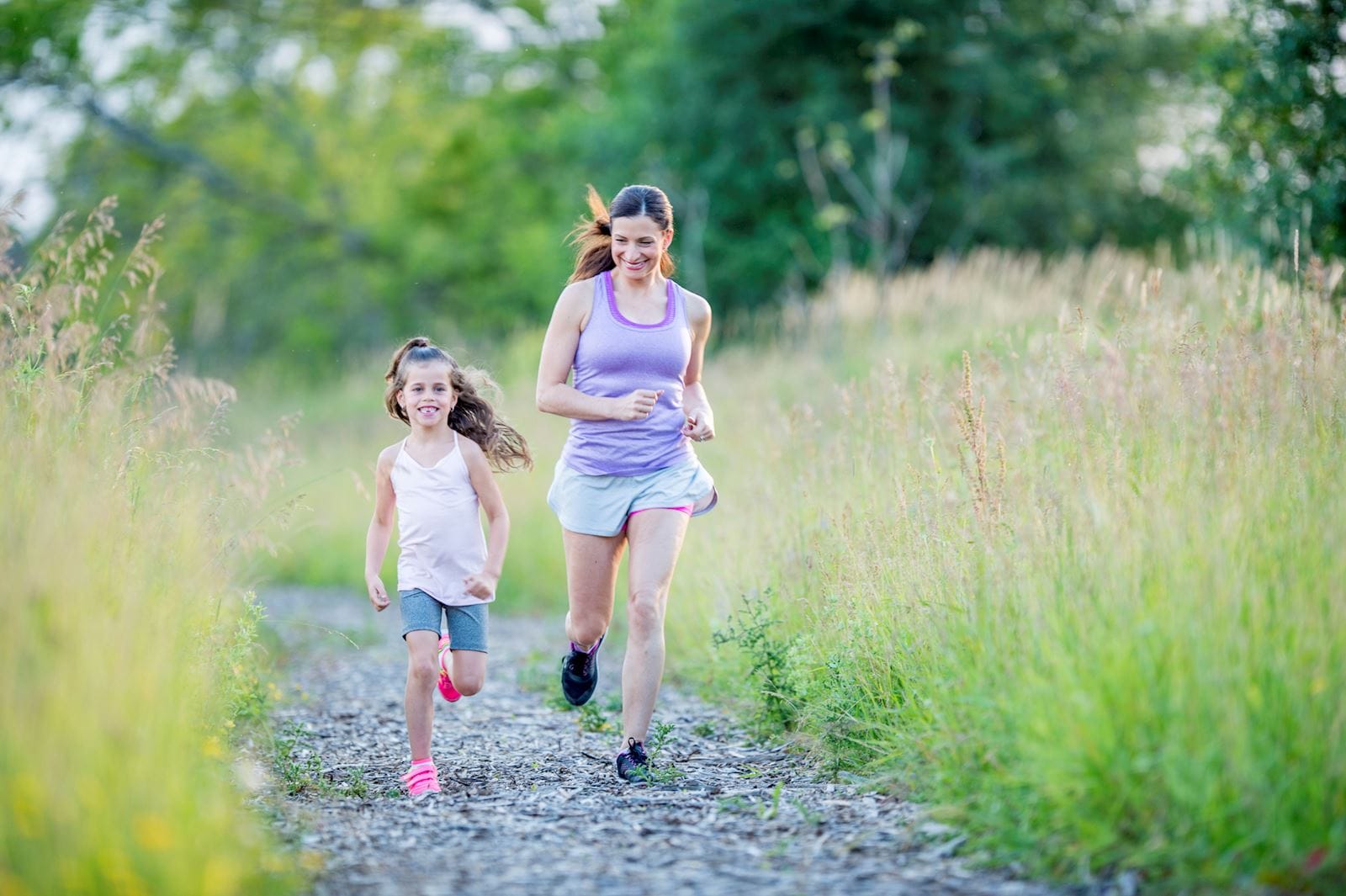 Woman and daughter run outside