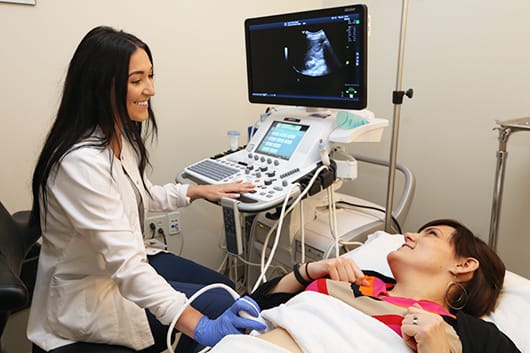 Tech and patient with an ultrasound